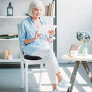 Donut pillow for tailbone pain relief, pregnancy, and post-surgery support with memory foam comfort.